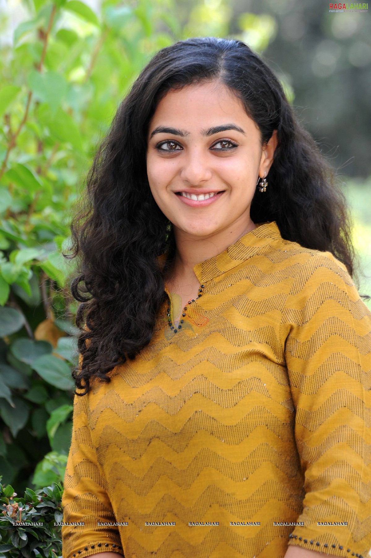 Nithya Menon at 180 Movie Press Meet, Hyderabad, Photo Gallery