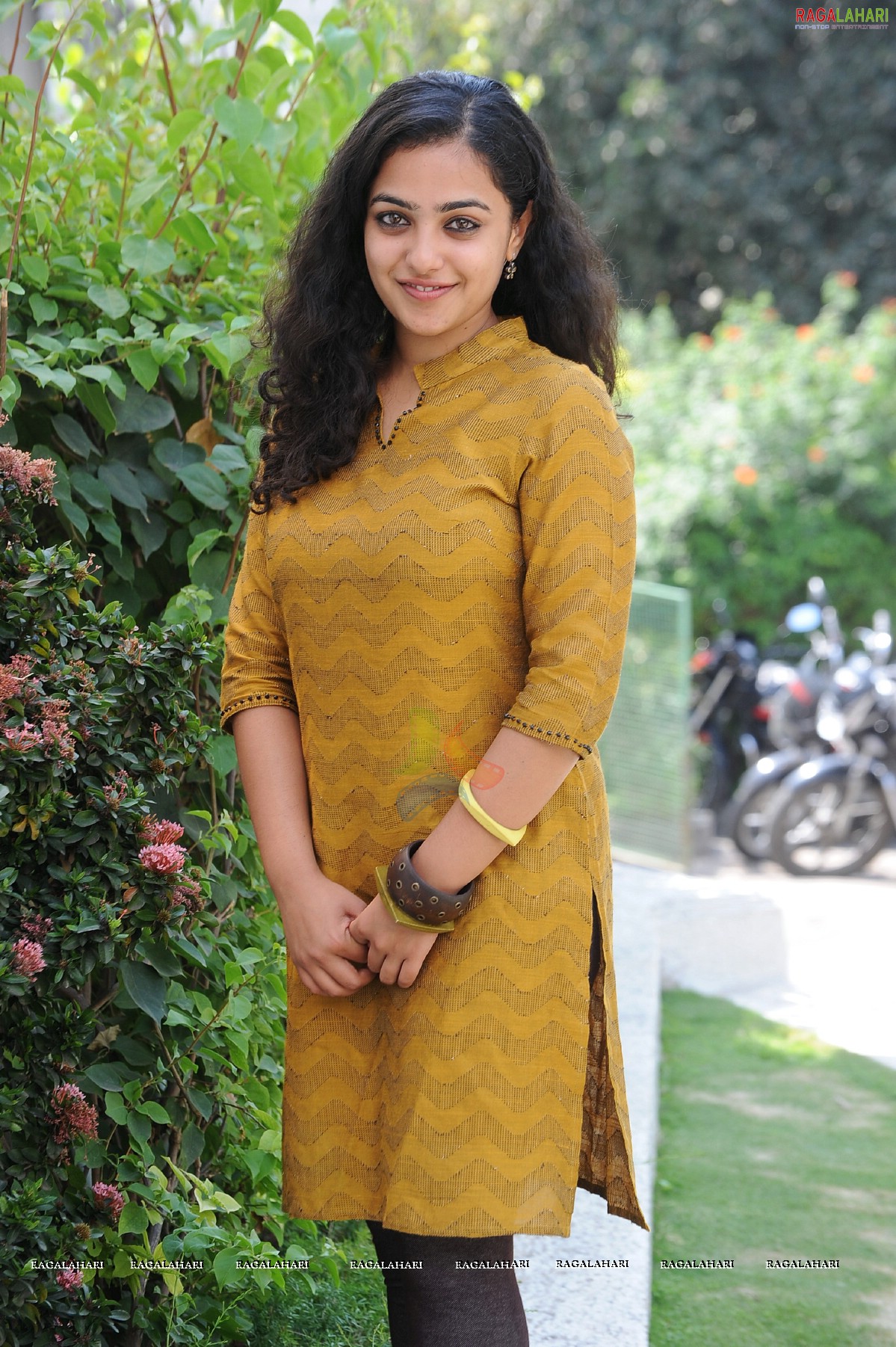 Nithya Menon at 180 Movie Press Meet, Hyderabad, Photo Gallery