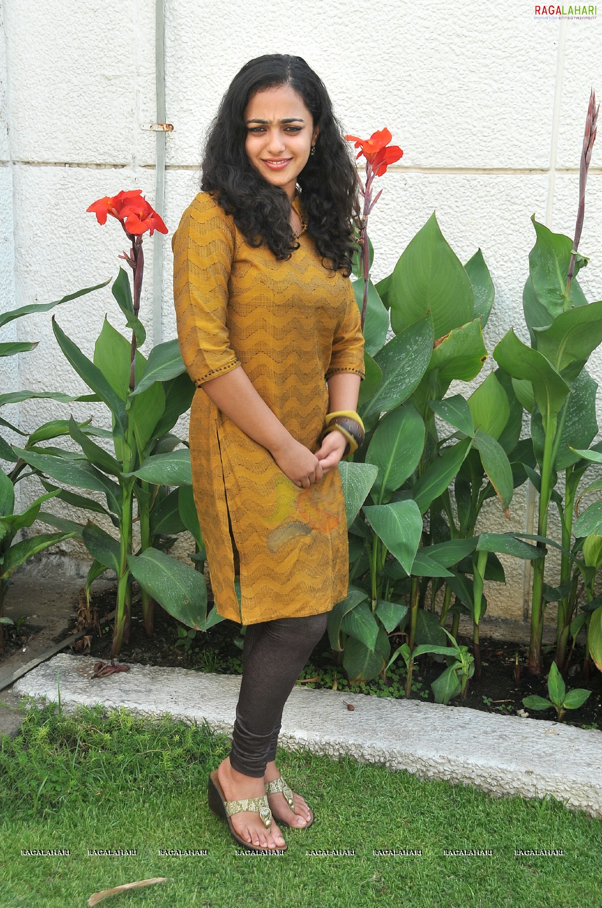 Nithya Menon at 180 Press Meet, Photo Gallery, Images