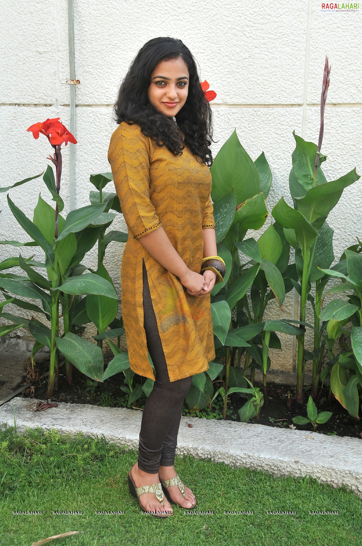 Nithya Menon at 180 Press Meet, Photo Gallery, Images