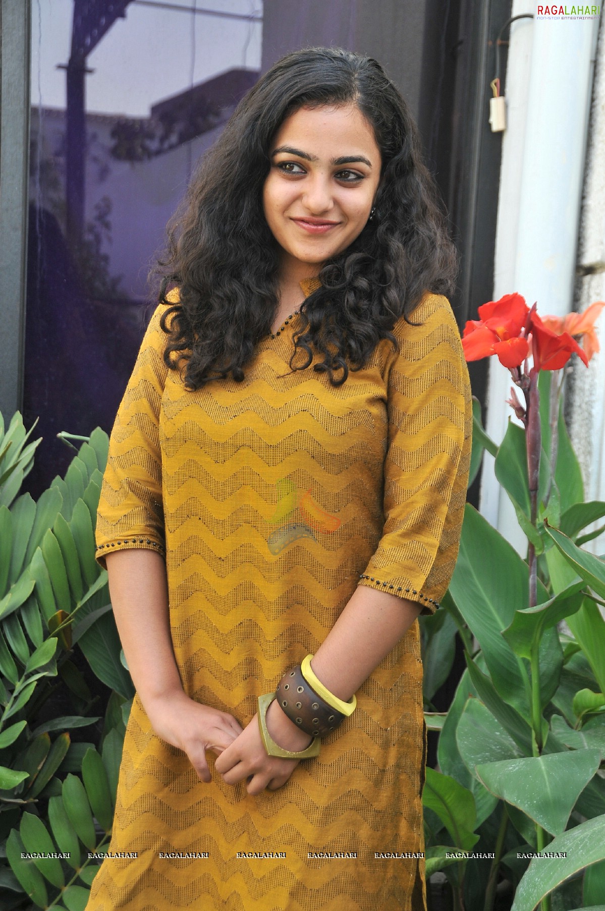 Nithya Menon at 180 Press Meet, Photo Gallery, Images