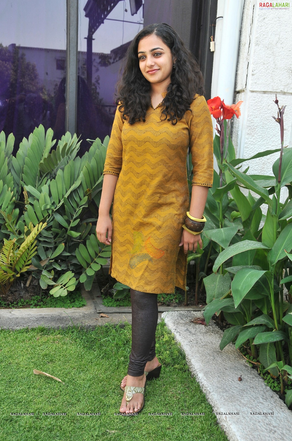 Nithya Menon at 180 Press Meet, Photo Gallery, Images