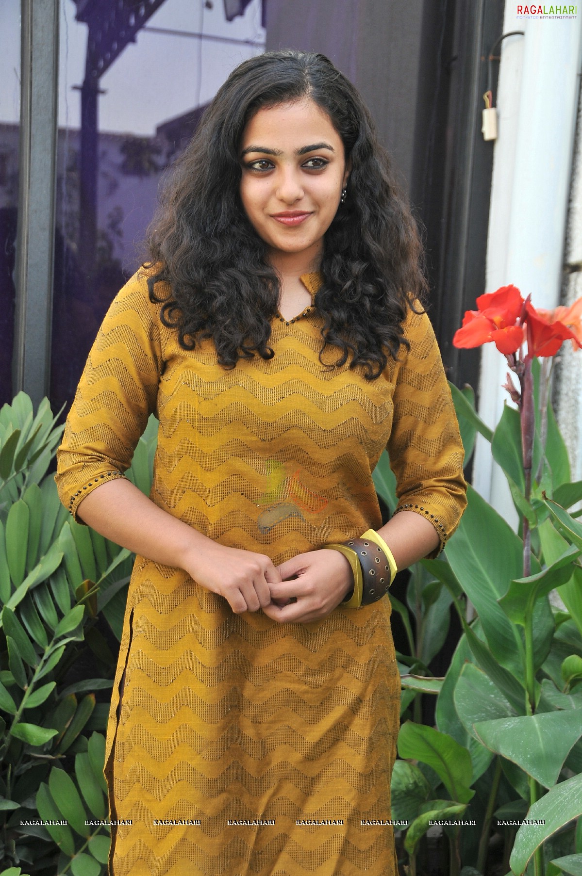 Nithya Menon at 180 Press Meet, Photo Gallery, Images