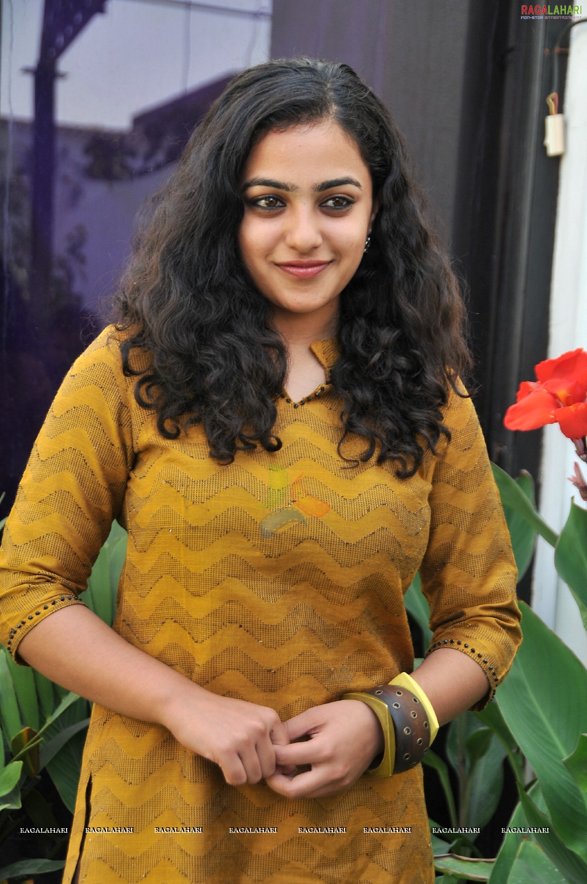 Nithya Menon at 180 Press Meet, Photo Gallery, Images