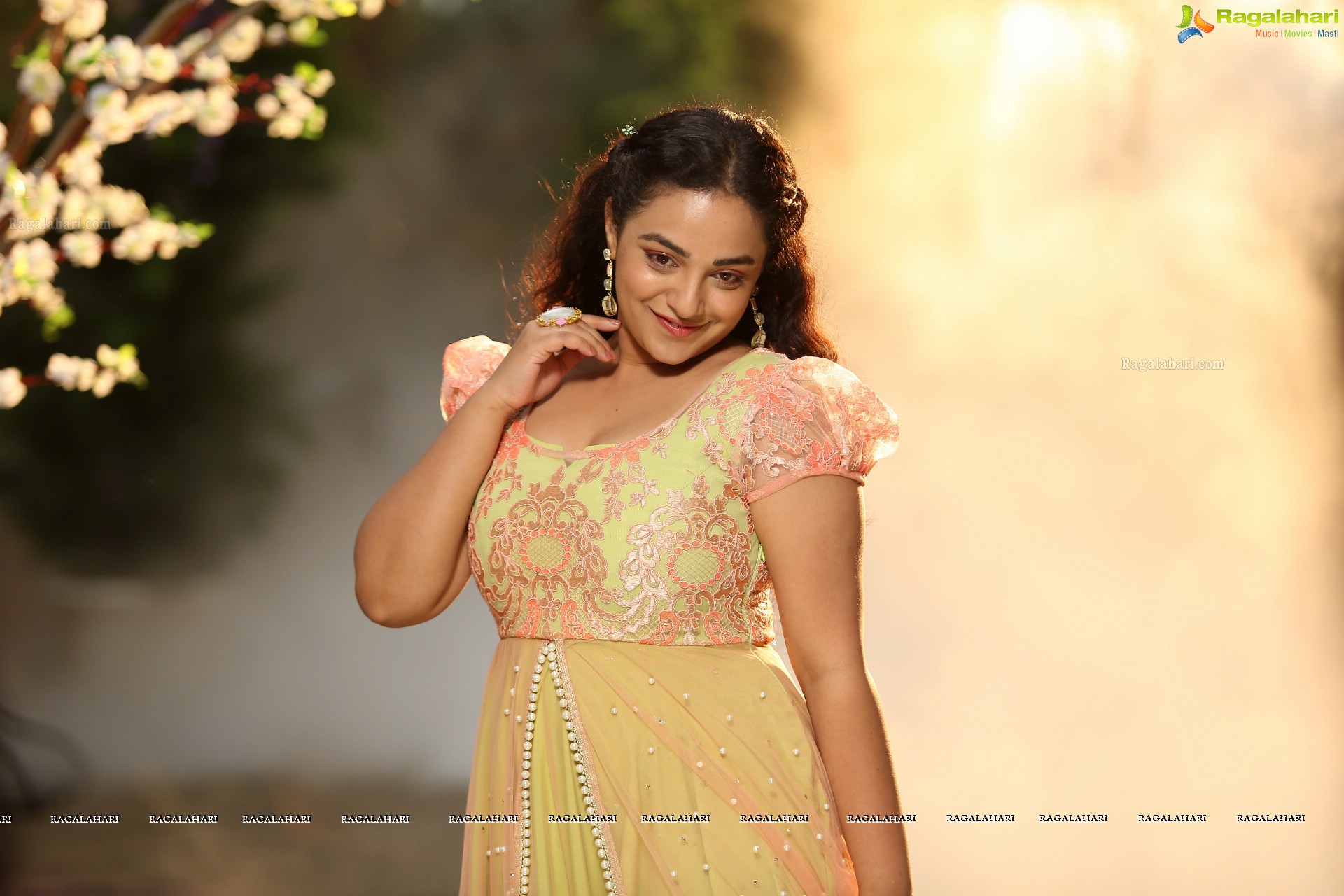 Nithya Menen Stills in Kotikkokadu, HD Photo Gallery, Images