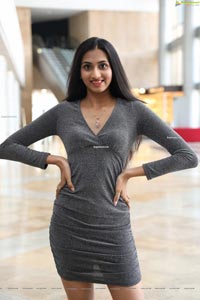 Laya Jupally in Gray Knit Bodycon Dress