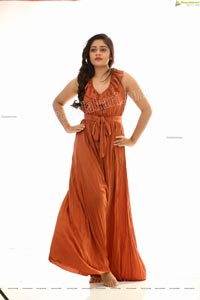 Deepa Umapathy in Rust Pleated Knot-Front Jumpsuit