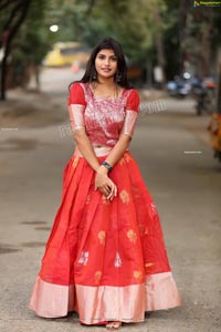 Kirthana Shiny in Red Ornate Lehenga