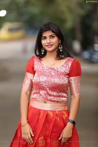 Kirthana Shiny in Red Ornate Lehenga