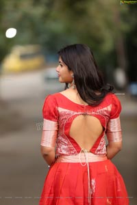 Kirthana Shiny in Red Ornate Lehenga