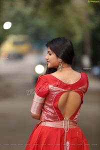 Kirthana Shiny in Red Ornate Lehenga