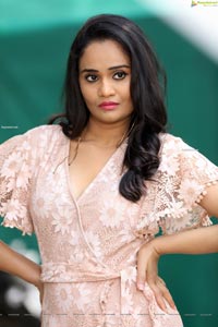 Usha Kurapati in Champagne Lace Mini Dress