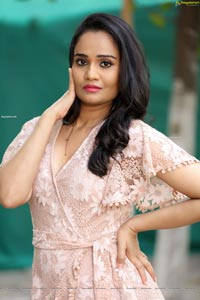 Usha Kurapati in Champagne Lace Mini Dress