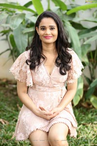 Usha Kurapati in Champagne Lace Mini Dress