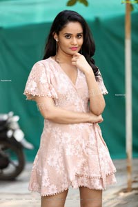 Usha Kurapati in Champagne Lace Mini Dress