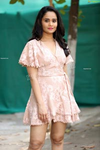 Usha Kurapati in Champagne Lace Mini Dress