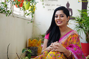 Aadhya Paruchuri in Yellow and Pink Floral Saree