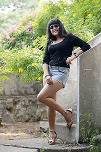 Richa Kalra in Black Top and Denim Shorts