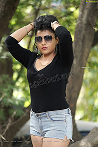 Richa Kalra in Black Top and Denim Shorts