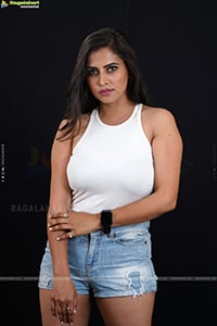 Jyothi Yadav in White Top and Denim Shorts