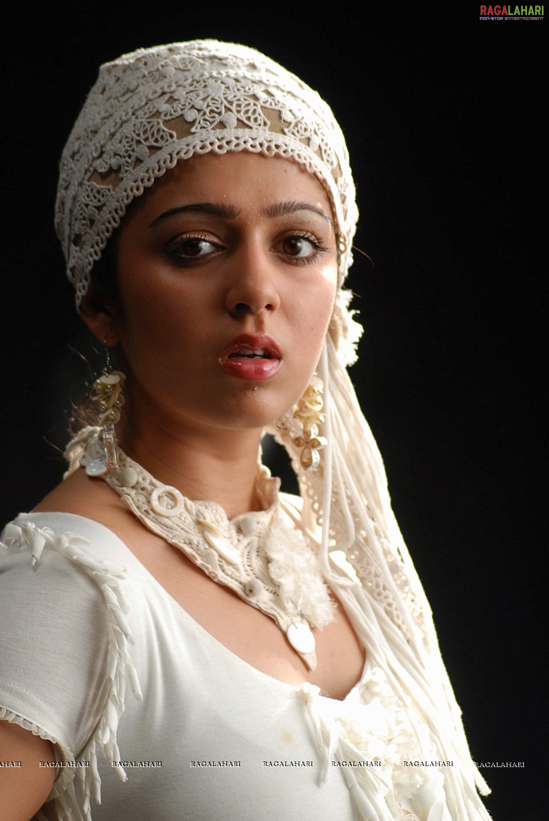 Charmi in White Dress Photos, Charmi in Mangala
