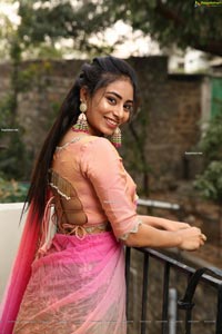 Honey Chowdary in Pink and Green Lehenga Choli