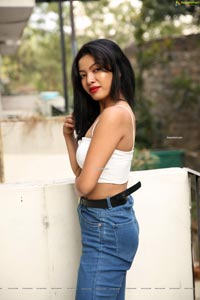 Kavita Mahatho in White Spaghetti Strap Crop Top and Jeans