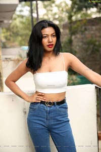 Kavita Mahatho in White Spaghetti Strap Crop Top and Jeans