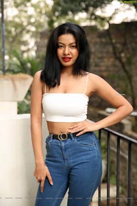 Kavita Mahatho in White Spaghetti Strap Crop Top and Jeans