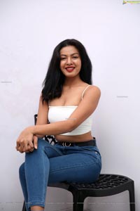 Kavita Mahatho in White Spaghetti Strap Crop Top and Jeans