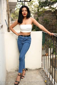 Kavita Mahatho in White Spaghetti Strap Crop Top and Jeans