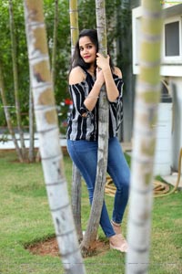 Usha Kurapati in Grey And Black Stripes Cold Shoulders Top