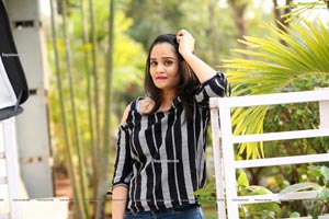 Usha Kurapati in Grey And Black Stripes Cold Shoulders Top