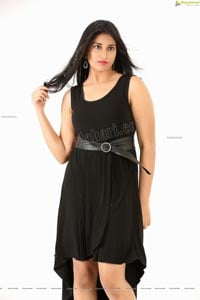 Akhila Ram in Black Sleeveless Tank High-Low-Hem Dress