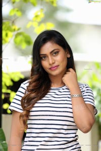 Priyanka Augustin in White Striped Top and Shorts