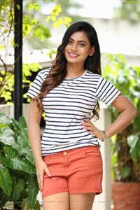 Priyanka Augustin in White Striped Top and Shorts