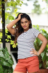 Priyanka Augustin in White Striped Top and Shorts