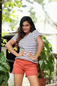 Priyanka Augustin in White Striped Top and Shorts