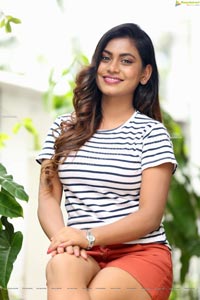 Priyanka Augustin in White Striped Top and Shorts