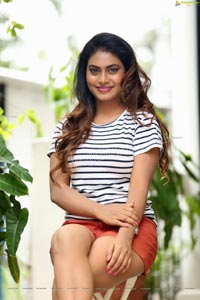 Priyanka Augustin in White Striped Top and Shorts