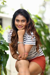 Priyanka Augustin in White Striped Top and Shorts