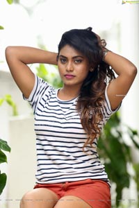 Priyanka Augustin in White Striped Top and Shorts