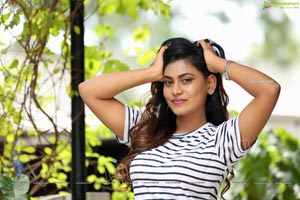 Priyanka Augustin in White Striped Top and Shorts