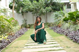 Shraavya Reddy in Bottle Green Pleated Jumpsuit