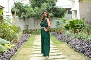 Shraavya Reddy in Bottle Green Pleated Jumpsuit