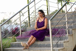 Shraavya Reddy in Purple Velvet Mini Dress