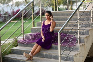 Shraavya Reddy in Purple Velvet Mini Dress