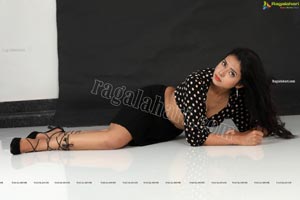 Swati Mandal in Black Front Tie Crop Top and Mini Skirt