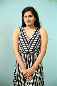 Tara Chowdary in Black and White Striped Dress