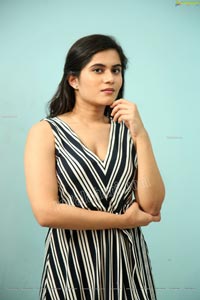 Tara Chowdary in Black and White Striped Dress